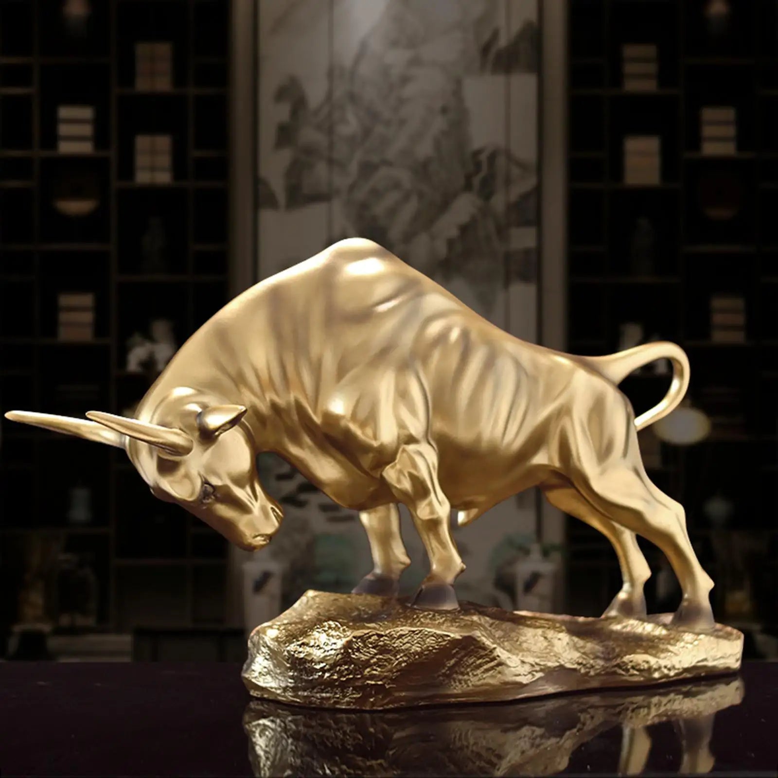 J.Y.R® BullRun Statue – golden bull figurine capturing strength and movement.